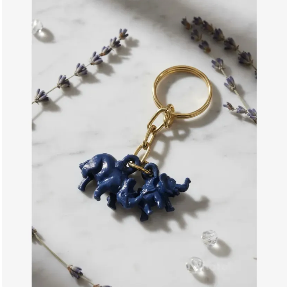 Llavero De Rinoceronte Y Elefante Azul